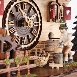 Trenkle Orologio a cucù al Quarzo Casa con Taglialegna in Movimento e la Ruota del Mulino Si Gira, con Musica TU.484.QMT.HZZG